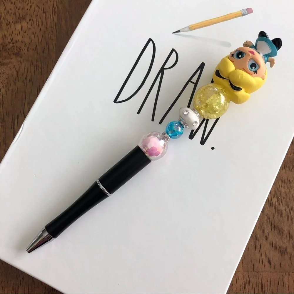 Disney Doorables: Alice in Wonderland: Alice falling handmade beaded pen